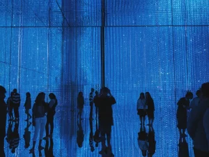 people-taking-pictures-blue-lights-surround