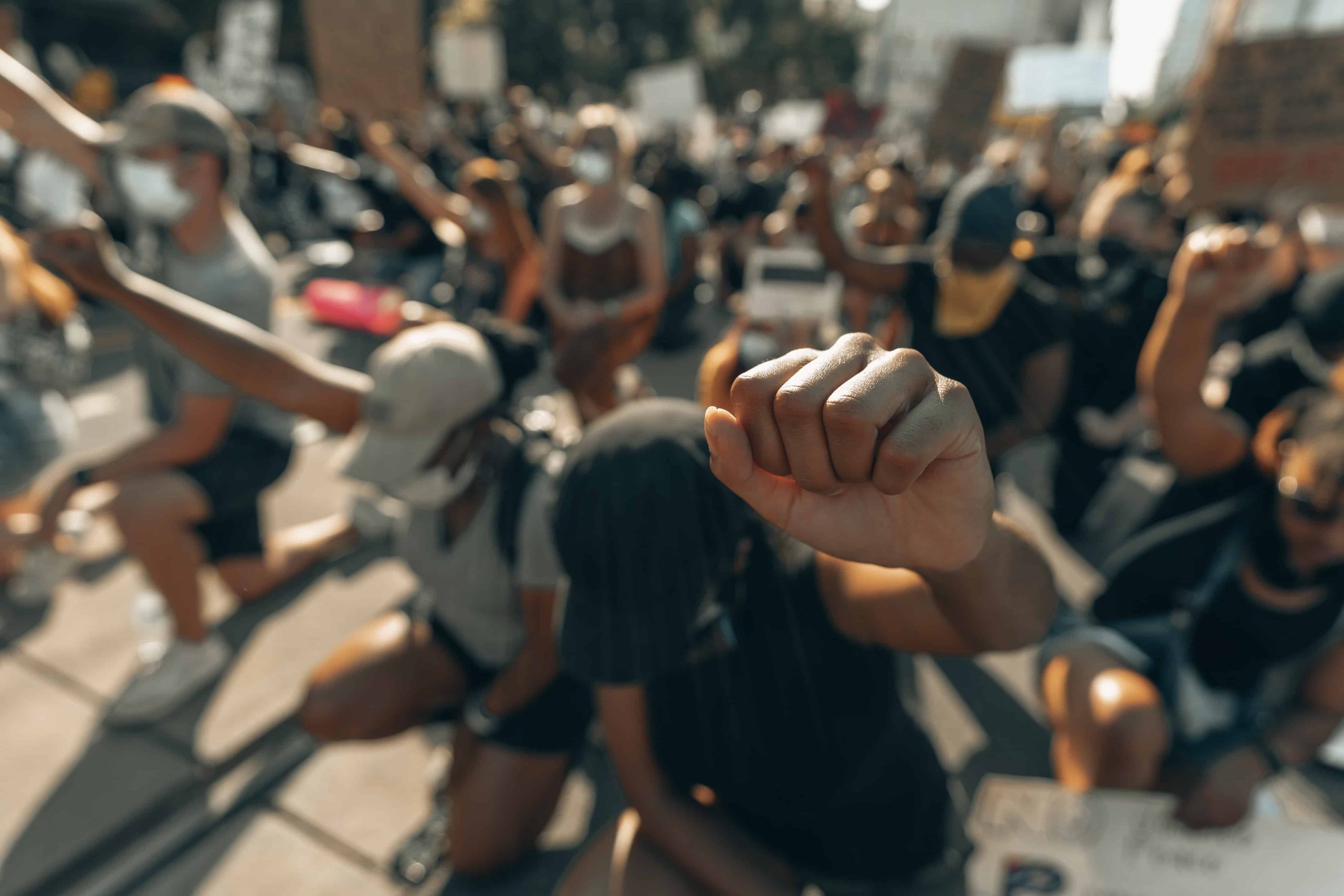 poeple raising hands