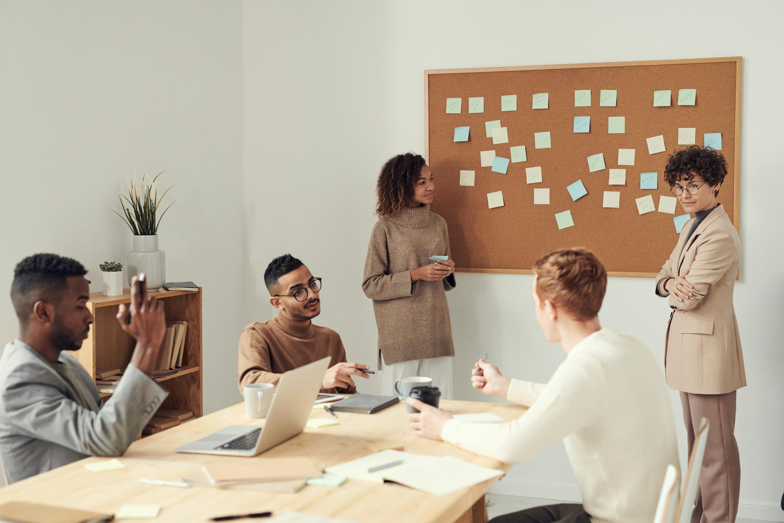group of people talking and planning