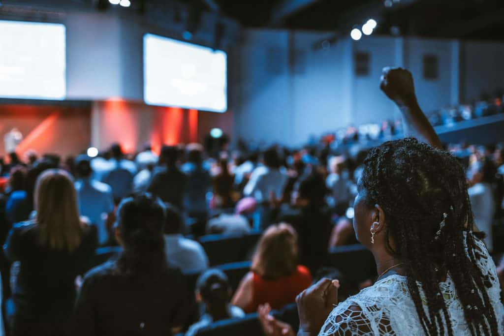 people raising hands