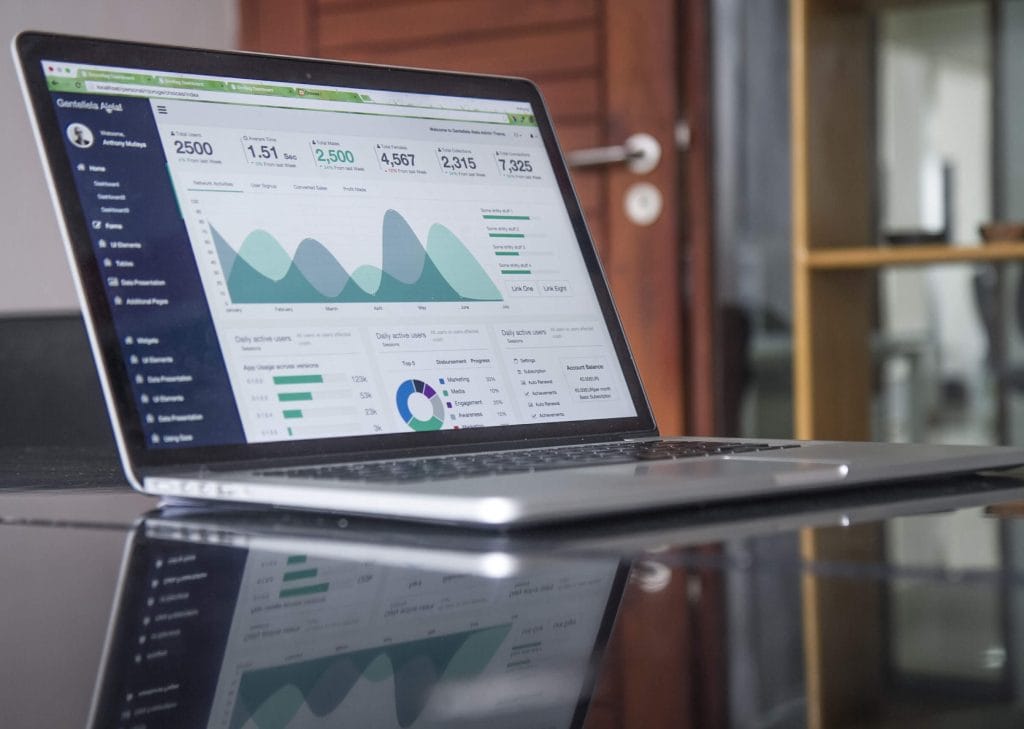 laptop with statistics showing
