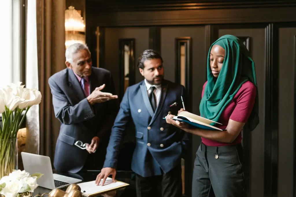 two-man-and-woman-in-meeting-room